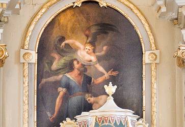 Obraz na hlavnom oltri kostola v Abrahme zobrazuje anjela, ktor zadriava ruku Abrahma pri obetovan svojho syna Izka. Snmka: Erika Litvkov